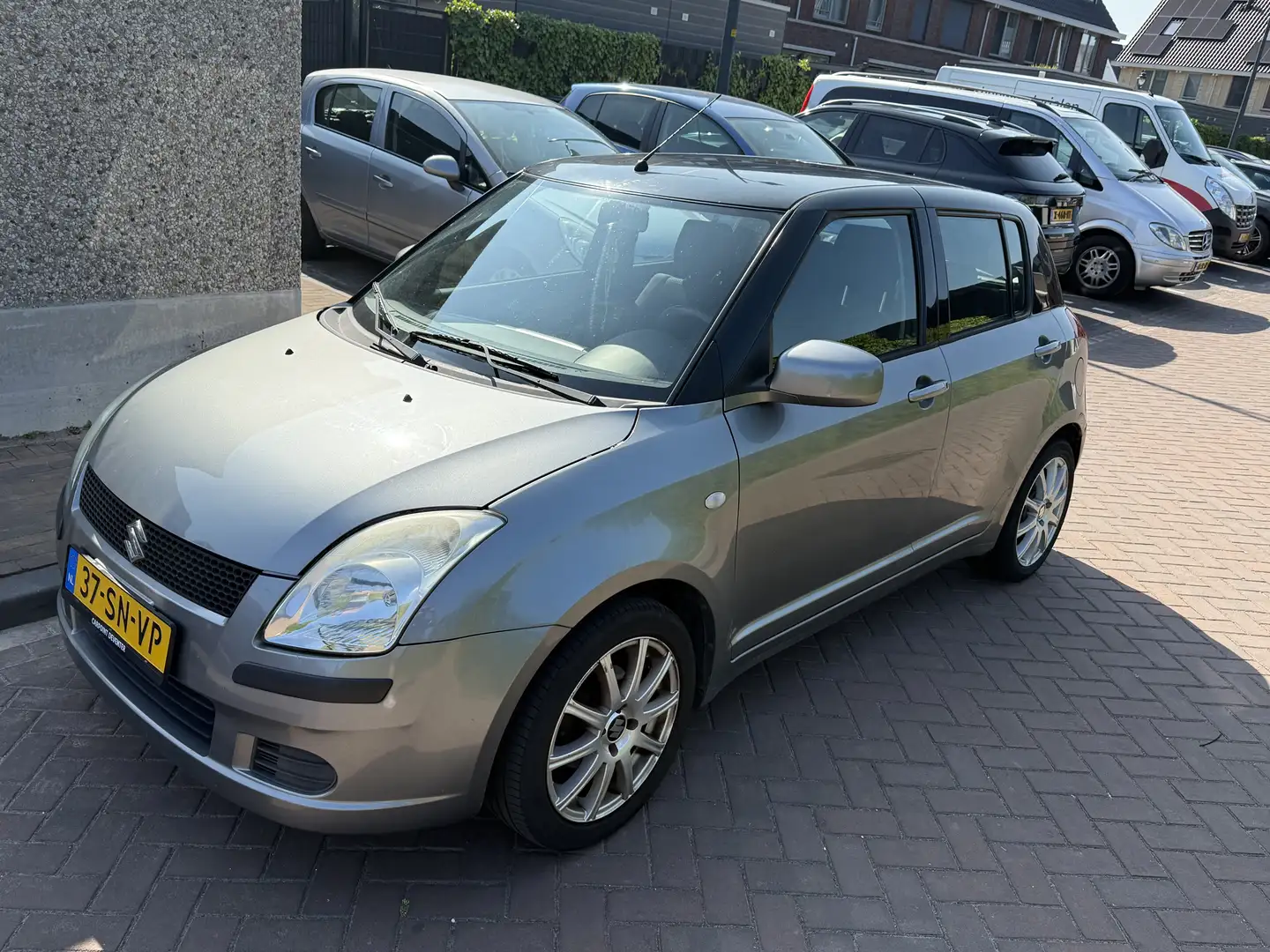 Suzuki Swift 1.3 GLS / met nap Gris - 1