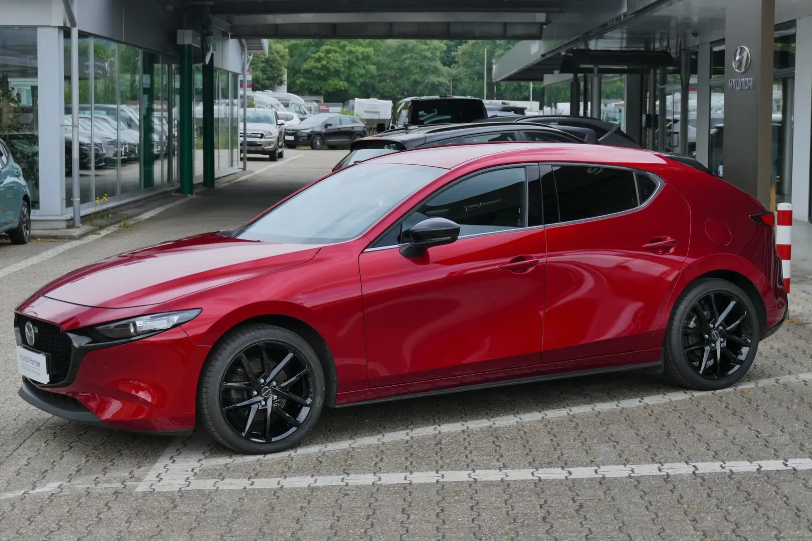Mazda 3 Homura Rot - 1