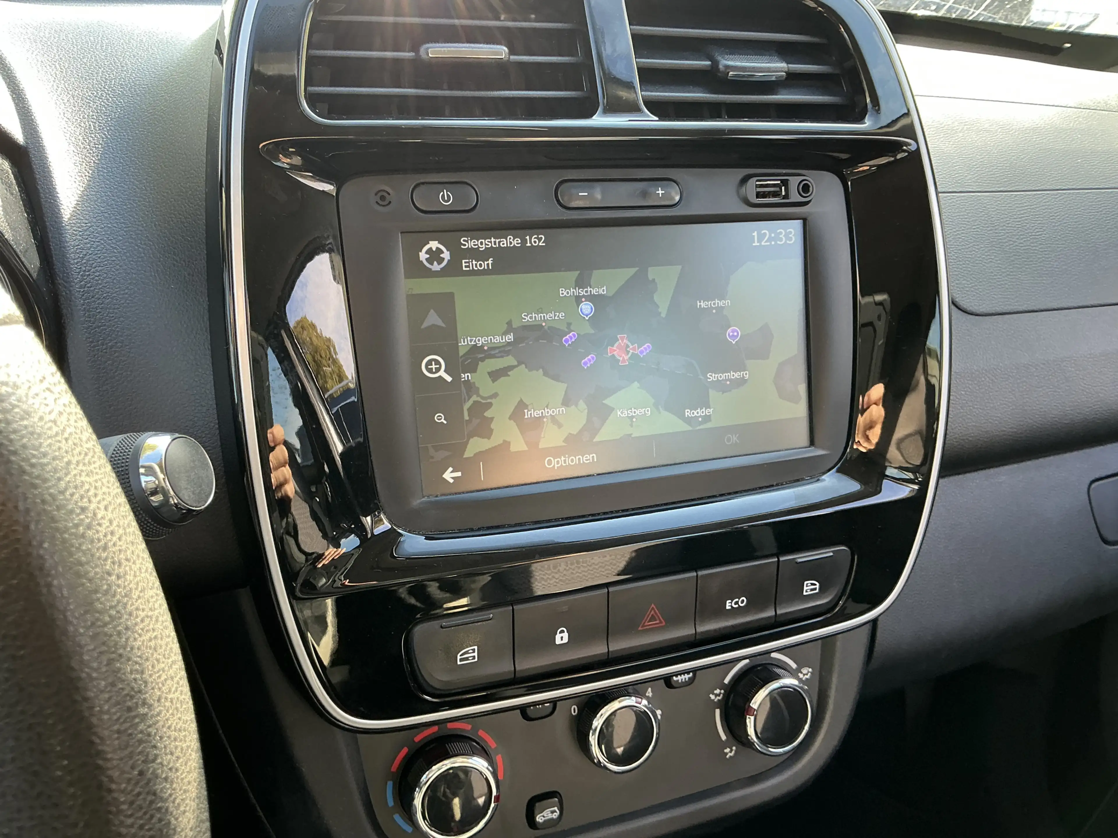 Dacia Spring Essential Teil-Leder R.Cam Navi LED PDC — photo 11