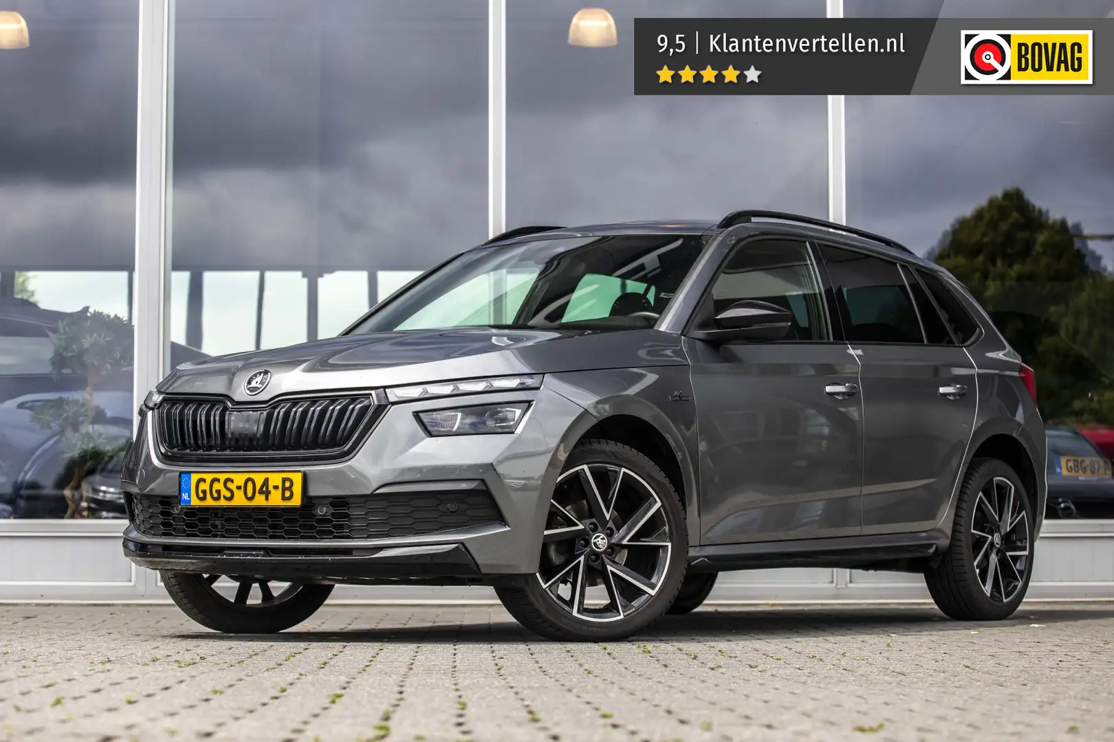 Skoda Kamiq 1.0 TSI Monte Carlo | Pano | Trekhaak | Keyless | Gris - 1