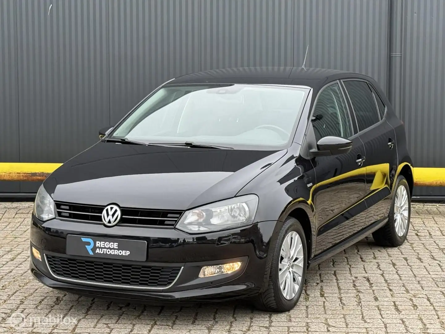 Volkswagen Polo 1.2 Highline CRUISE | PDC | CLIMA | TOPSTAAT Zwart - 1