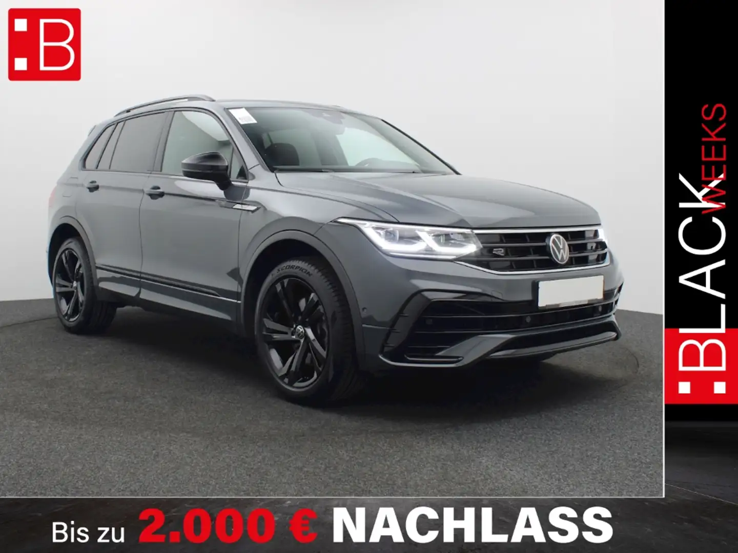 Volkswagen Tiguan 2.0 TDI DSG 4Mo. R-Line BLACK-STYLE PANO AHK NAVI Grau - 1