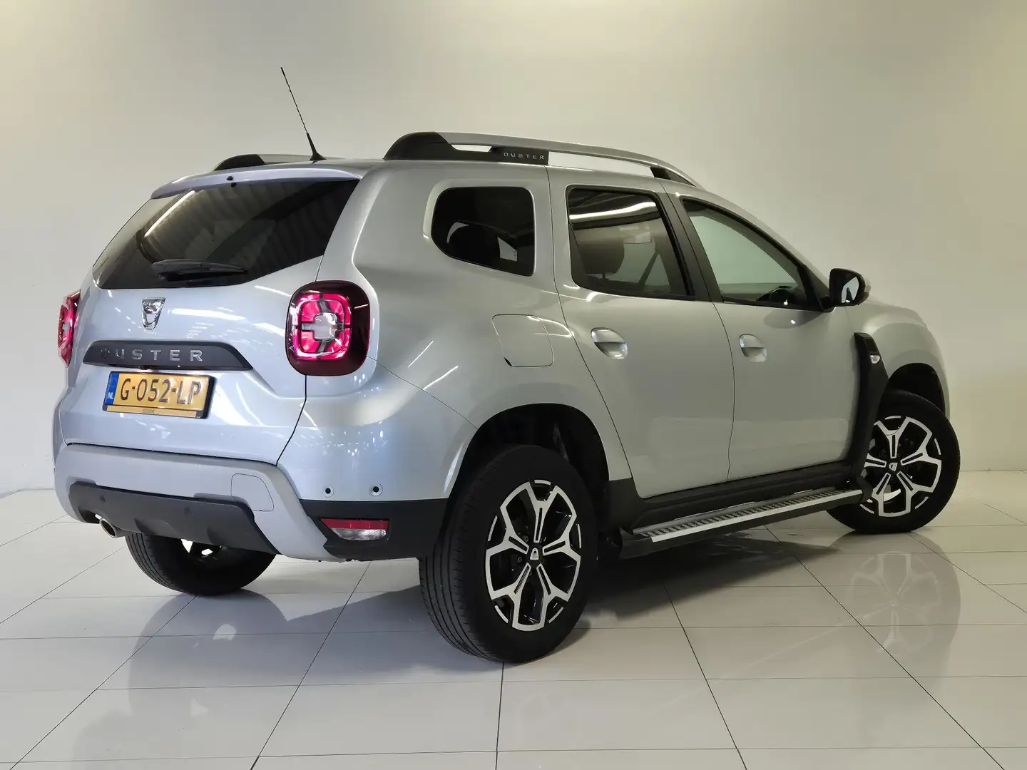 Dacia Duster 1.3 TCe Prestige | Navigatie | 360° Camera | Cruis Grau - 2