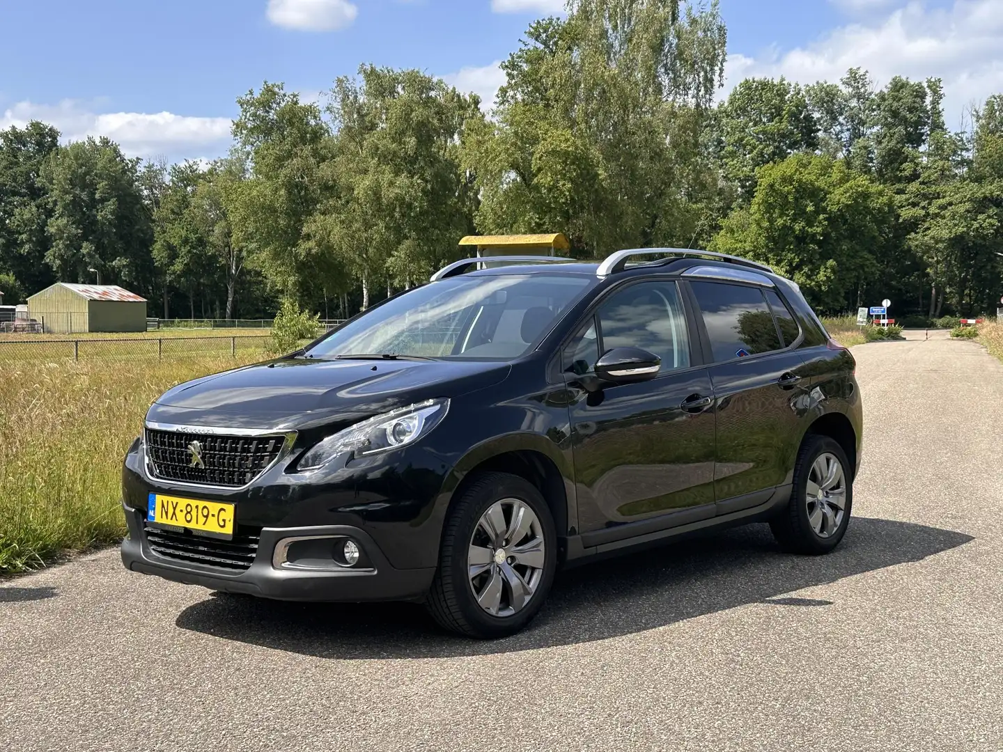 Peugeot 2008 1.2 PureTech Blue Lion | Panoramadak | Navi | CarP Noir - 1