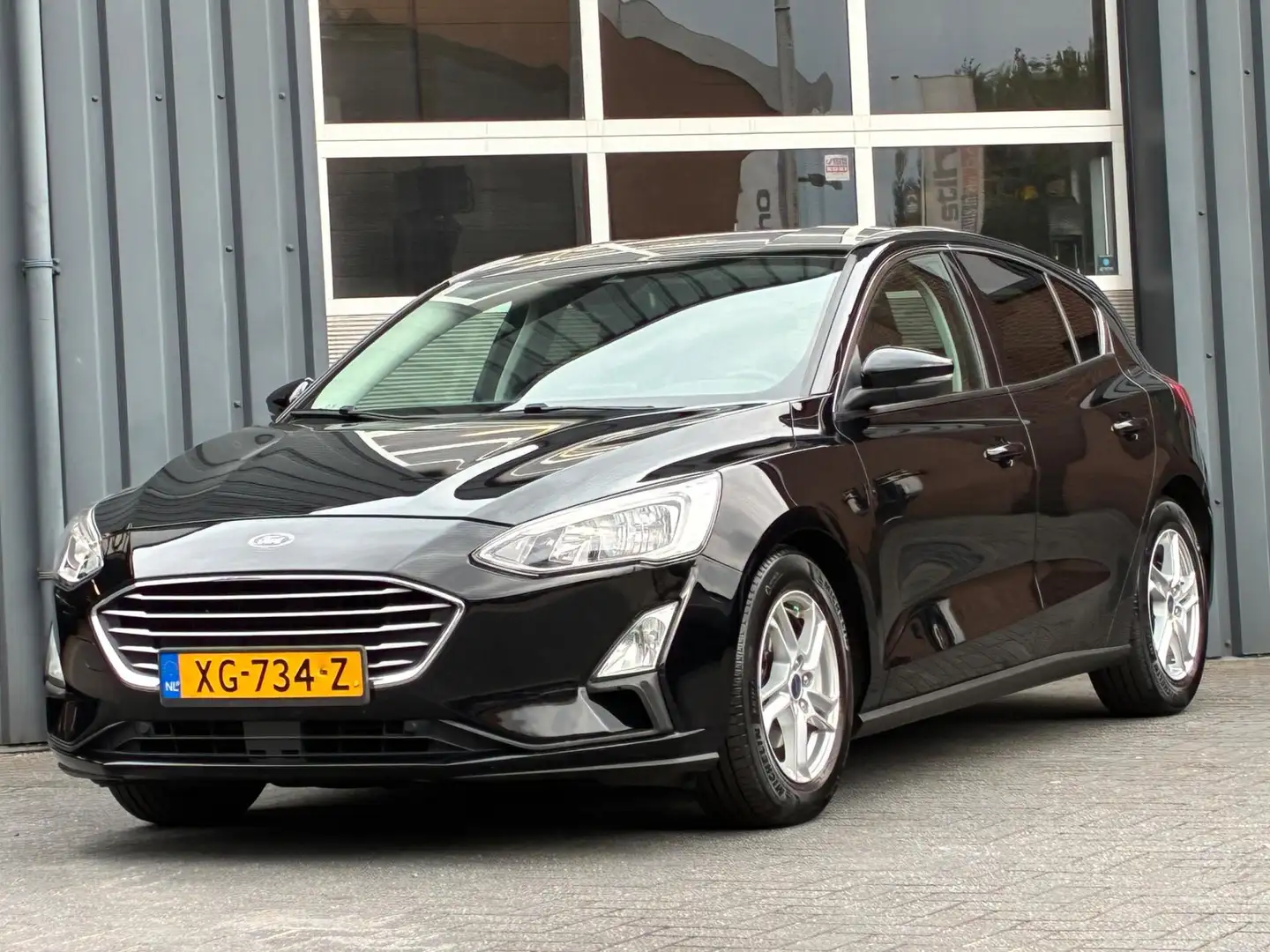 Ford Focus 1.0 EcoBoost Trend Edition Business Navigatie, Air Zwart - 1