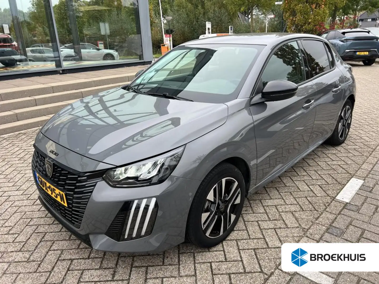 Peugeot e-208 EV Style 50 kWh | Automaat | Navigatie | Stoelverw Gris - 1