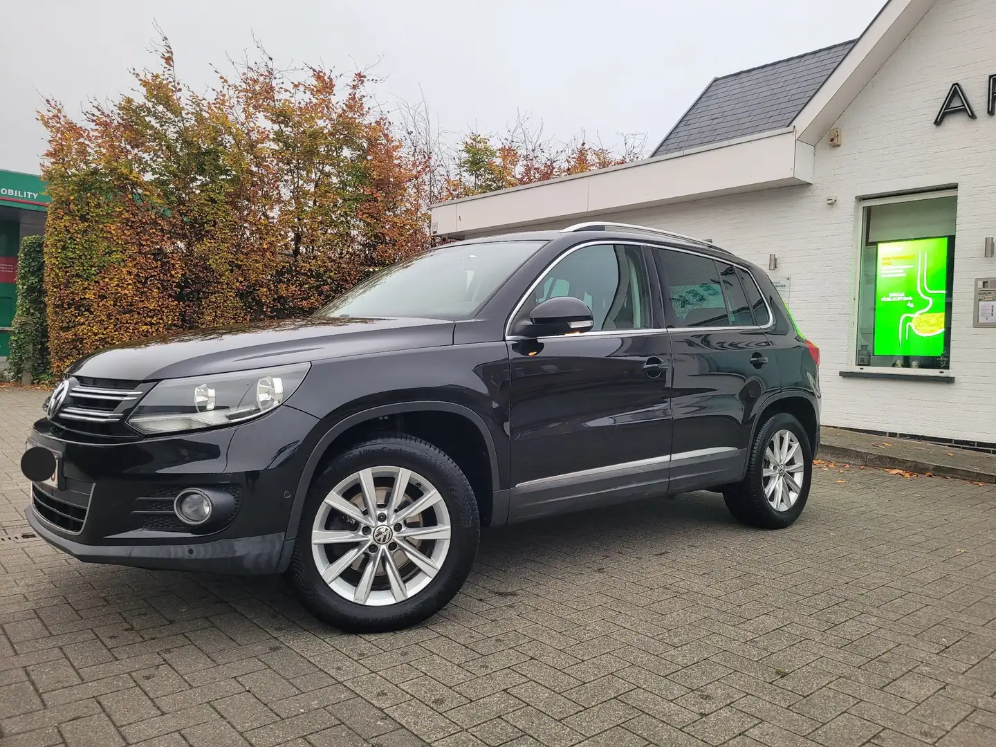 Volkswagen Tiguan 1.4 TSI Sport & Style BMT Zwart - 1