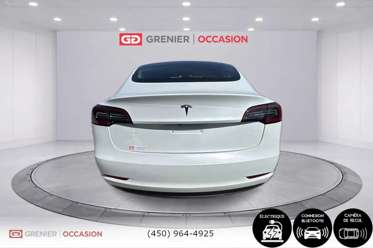 Tesla Model 3 photo Tesla Model 3