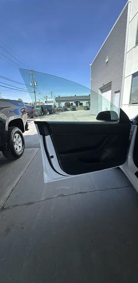 Tesla Model 3 photo Tesla Model 3