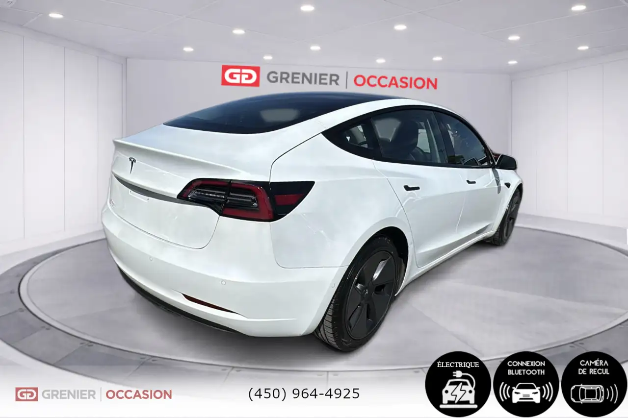 Tesla Model 3 photo Tesla Model 3