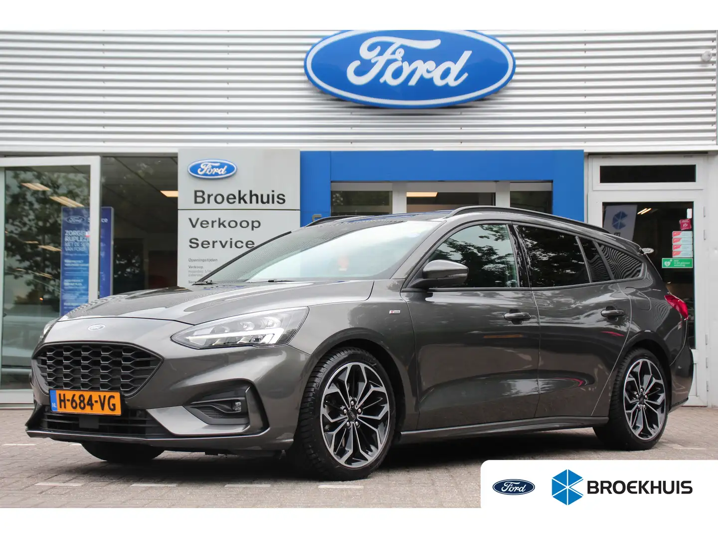 Ford Focus Wagon 1.0EB ST-LINE | NL-AUTO! | 1 EIGENAAR! | WIN Grijs - 1