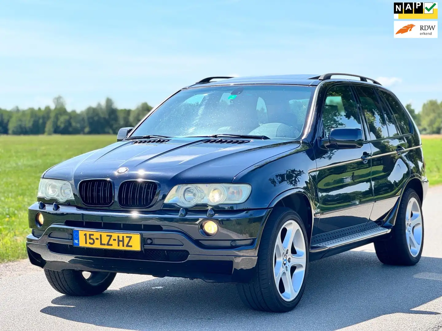 BMW X5 4.4i Executive|YOUNGTIMER|AUT|SCHUIFDAK|NAVI|LEDER Zwart - 1