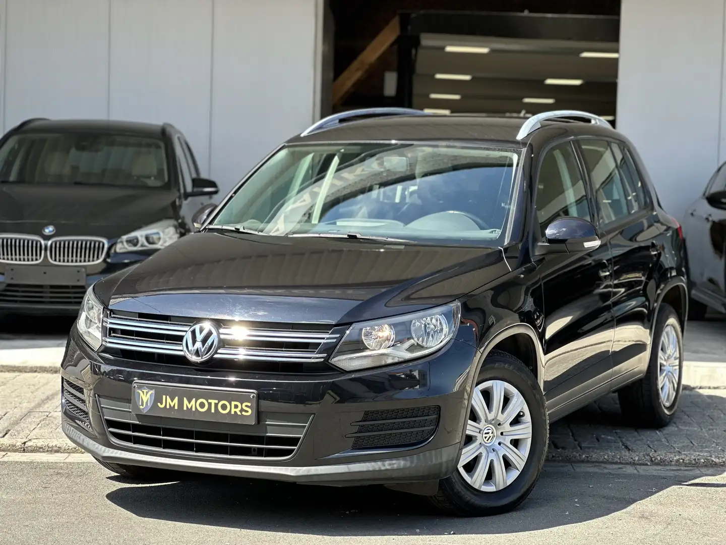 Volkswagen Tiguan 2.0 TDI BlueMotion / 1e Eigenaar / CarPass - 1