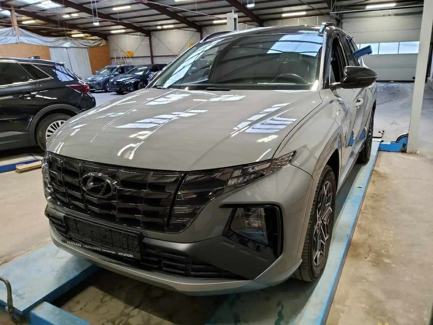 Hyundai TUCSON 1.6 T-GDI PHEV N Line 4WDI Carplay I Camera Grijs - 1