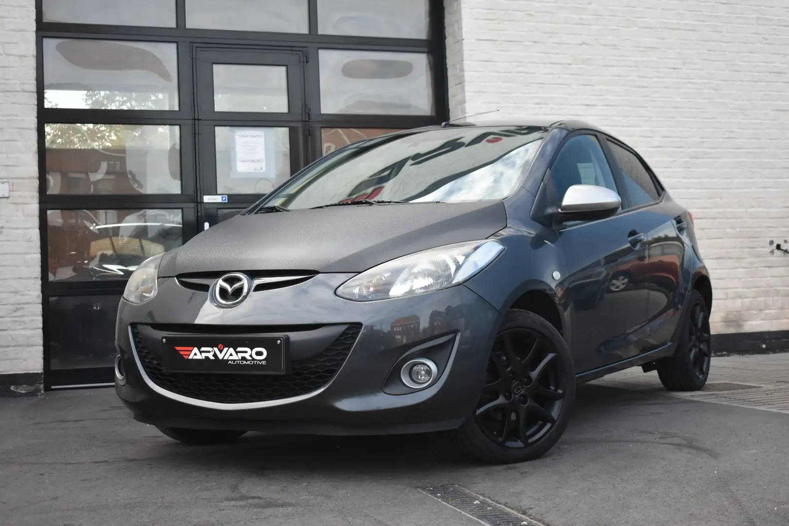 Mazda 2 1.3i Car Play / Navi / PDC / Airco / Garantie Gris - 2