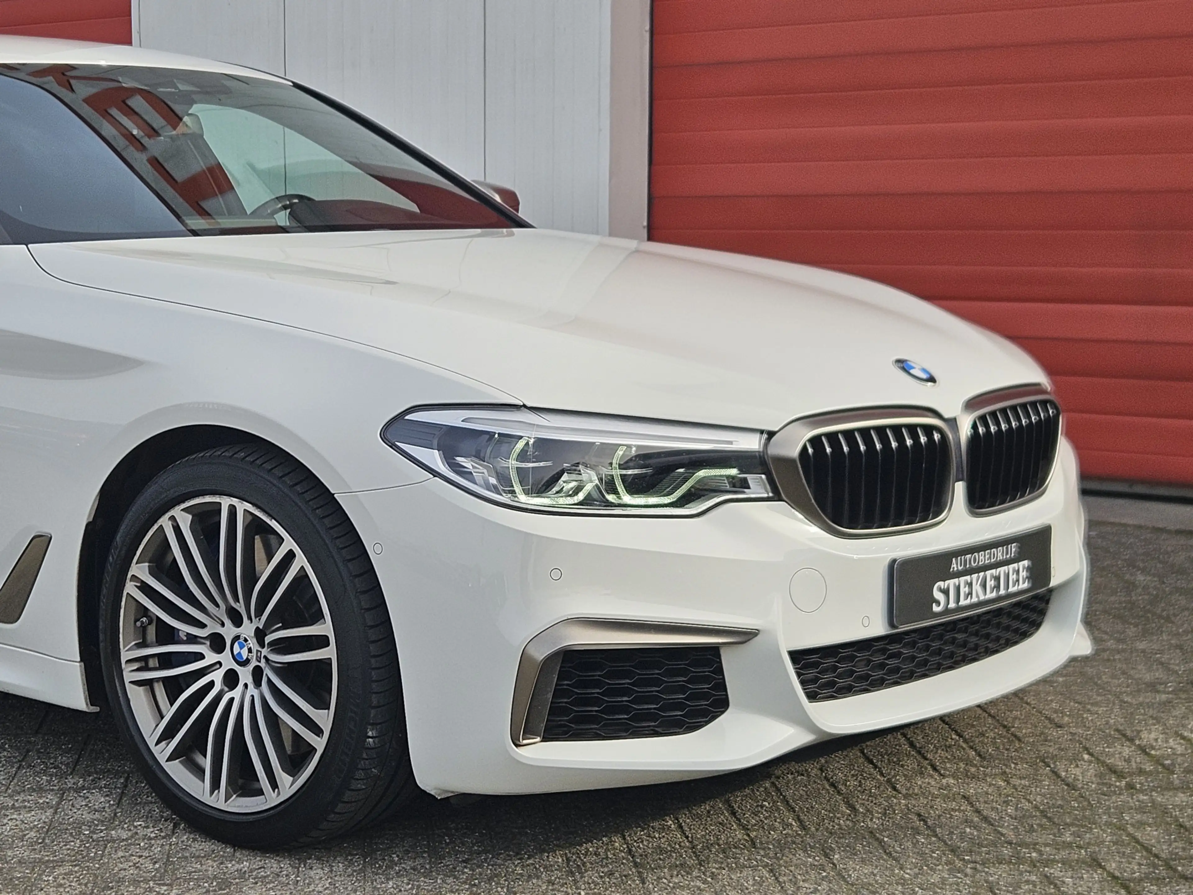 BMW M550 5-serie M550i xDrive High Executive | Head-up | El — photo 7