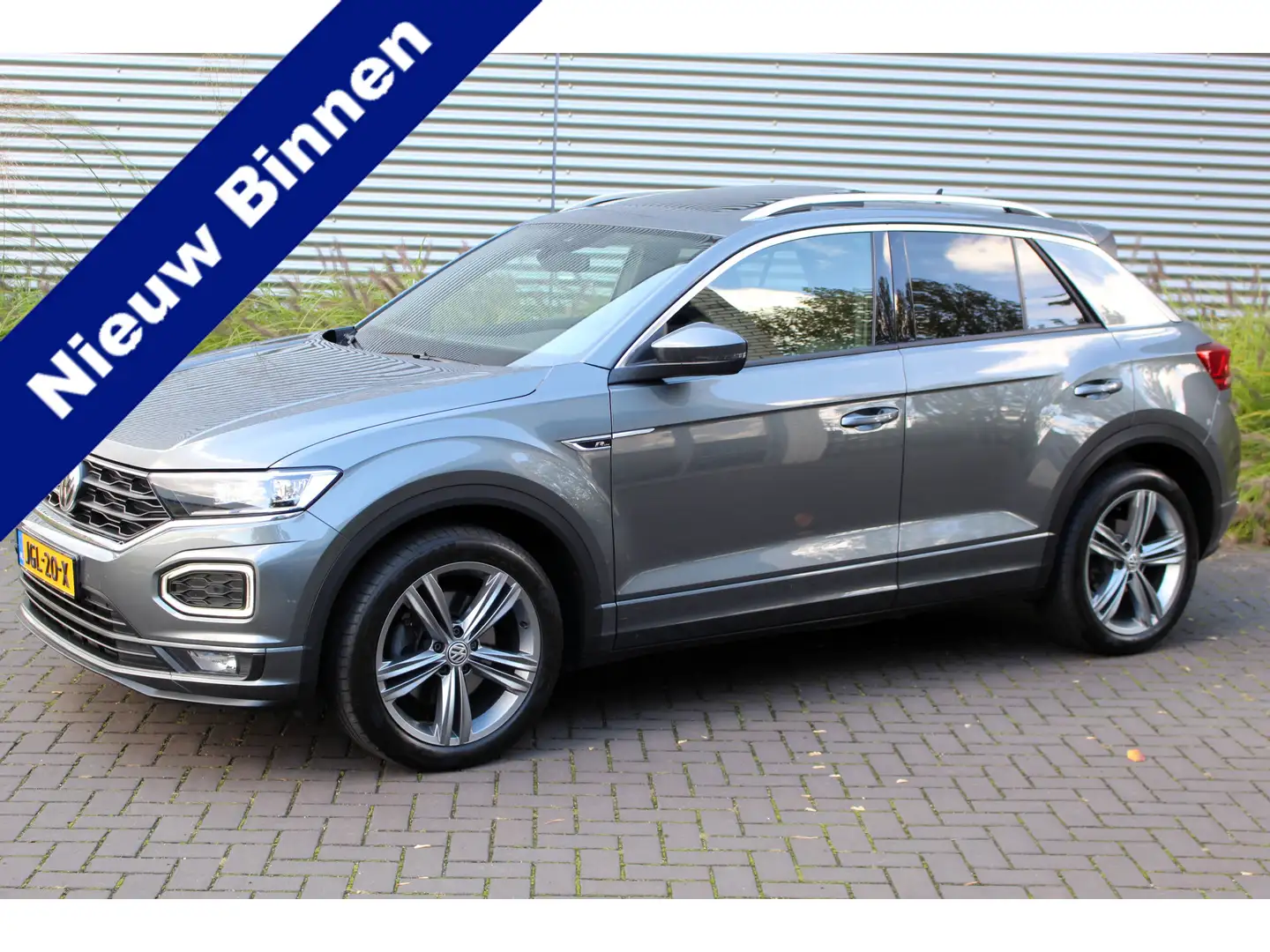 Volkswagen T-Roc 2.0 TSI 4Motion Sport Business R I NAVI I PANO.DAK Grijs - 1