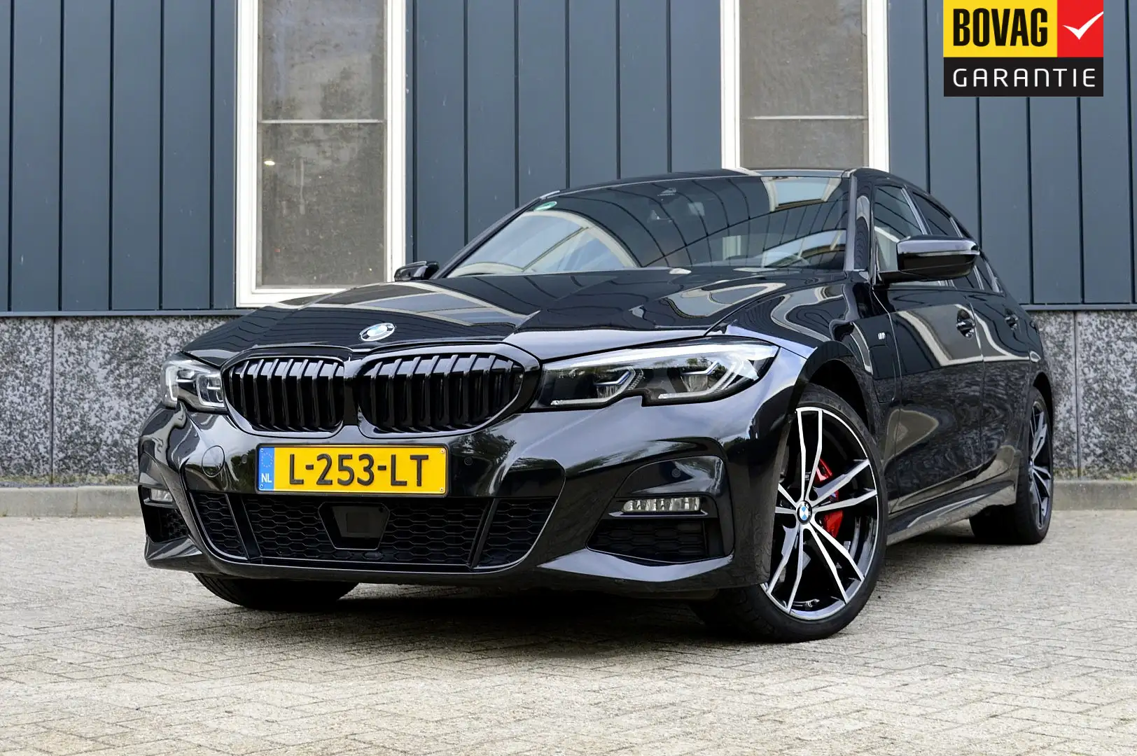 BMW 320 3-serie 320e M-Sport Rijklaarprijs-Garantie Naviga Nero - 1