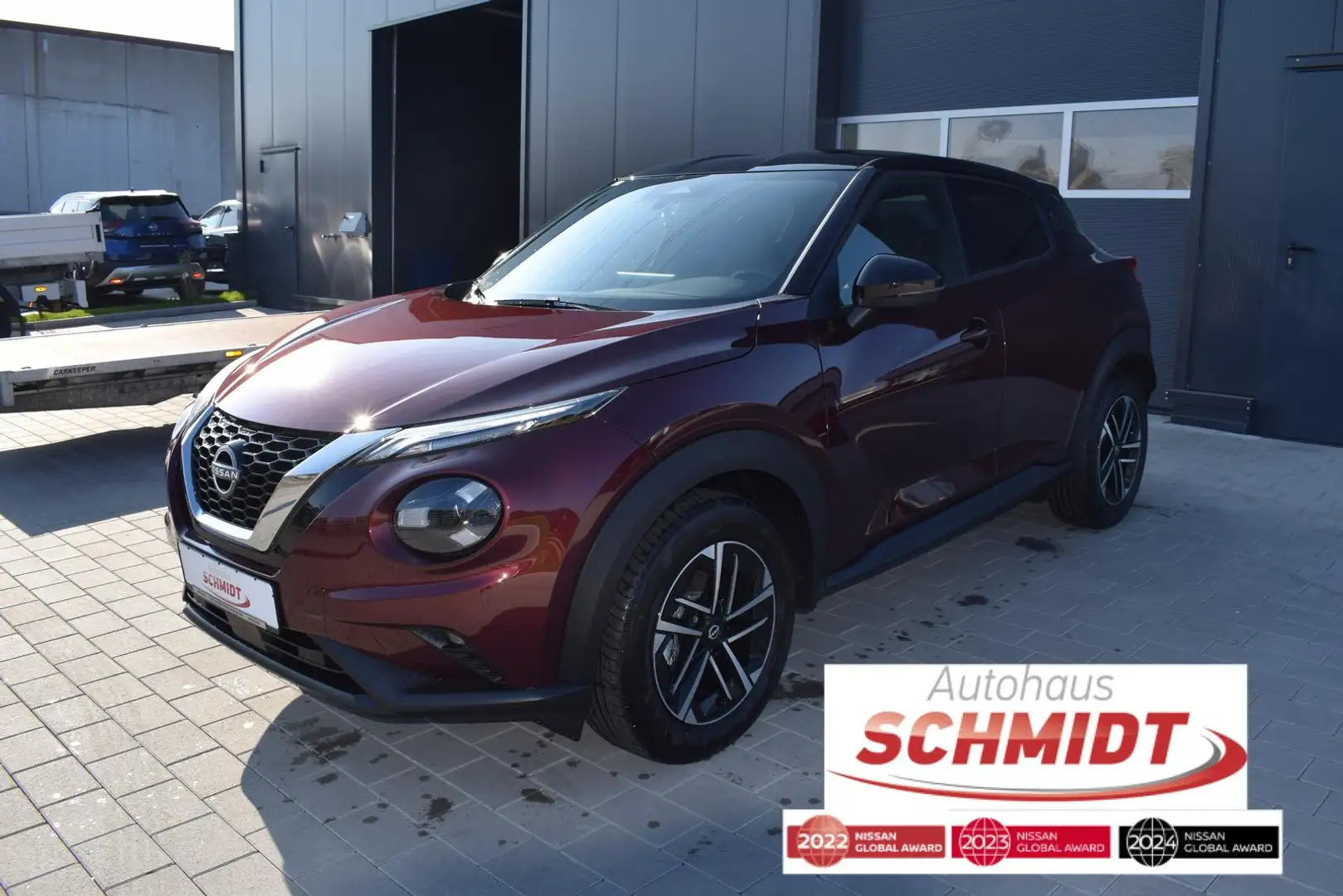 Nissan Juke 1.0 DIG-T N-Connecta Winter Rouge - 1