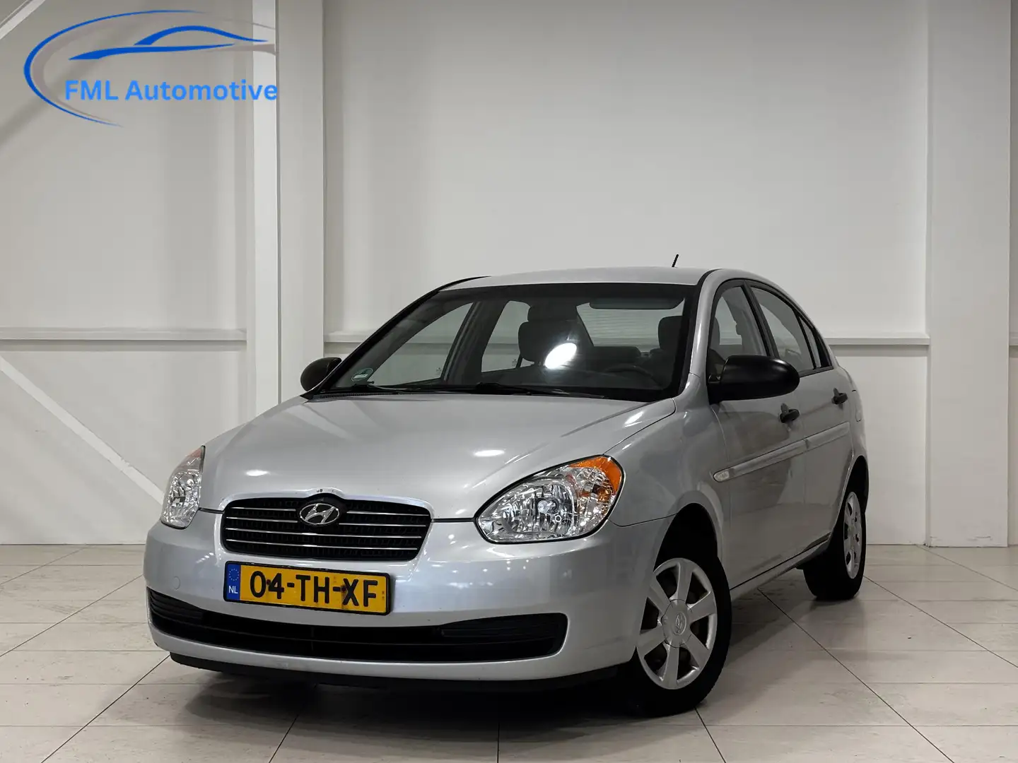 Hyundai ACCENT 1.4i Dynamic | Airco | Distributie riem vv | Nieuw Grau - 1