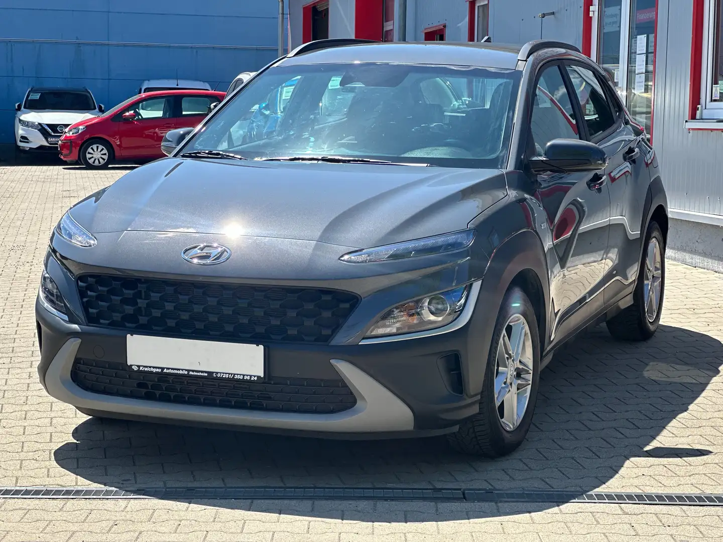 Hyundai KONA 1.0 T-GDI*Kamera*Klimaauto*Alarm*Sitz+Lenkradheizg Grau - 1
