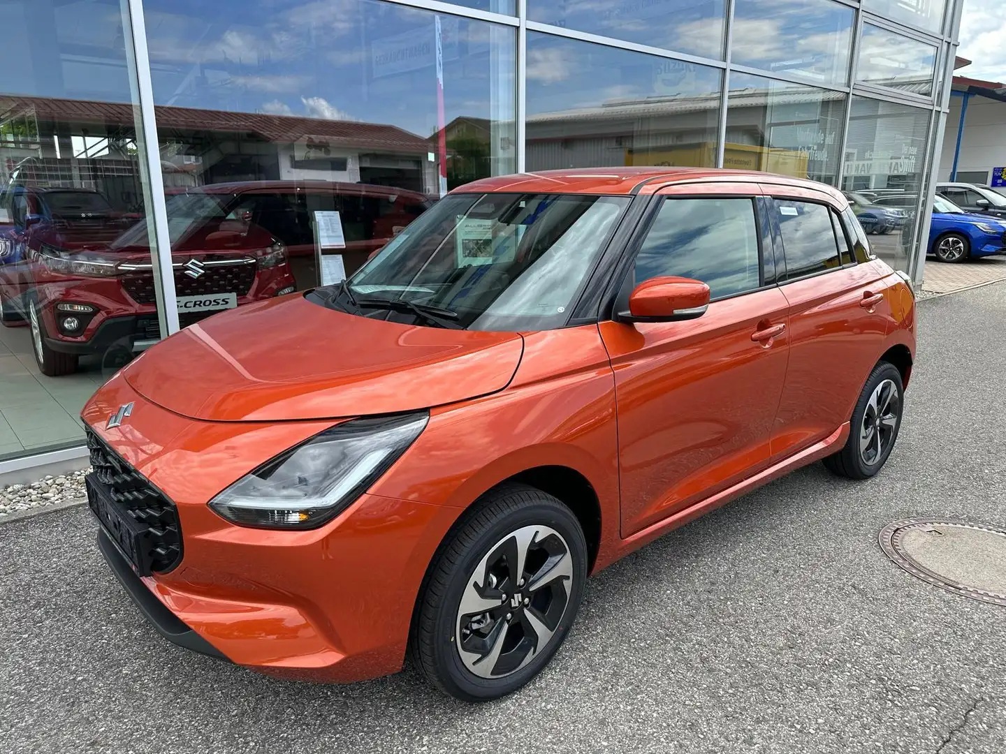 Suzuki Swift 1.2 Dualjet Hybrid 61 kW ALLGrip Comfort+ 1.2 M... Orange - 2