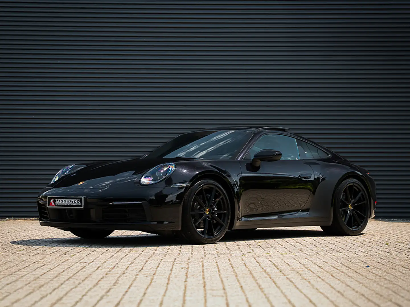 Porsche 992 3.0 Carrera BTW l Glazen schuif-/kanteldak l BOSE Zwart - 1
