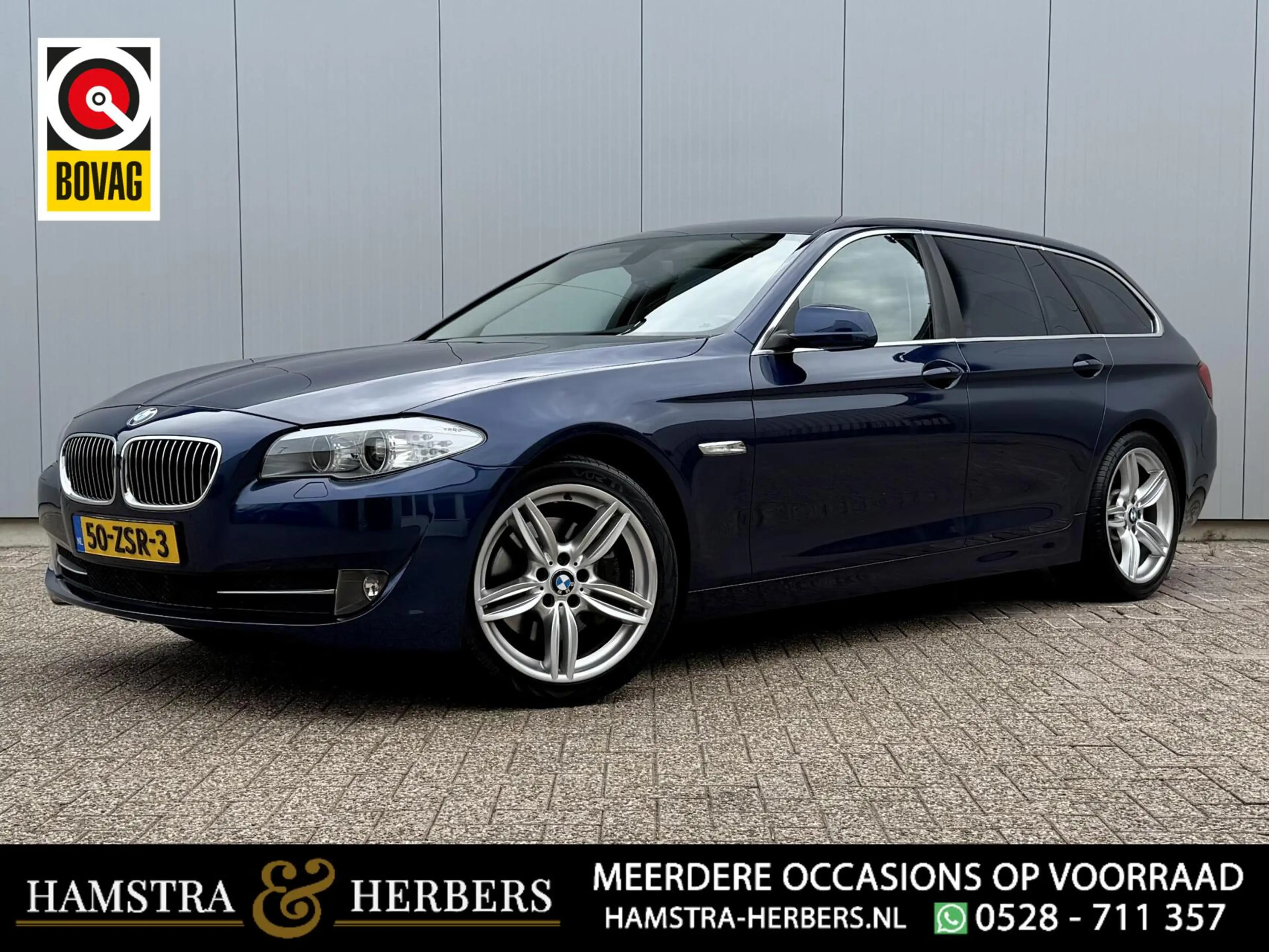 BMW 528 5-serie Touring 528xi Executive blauw