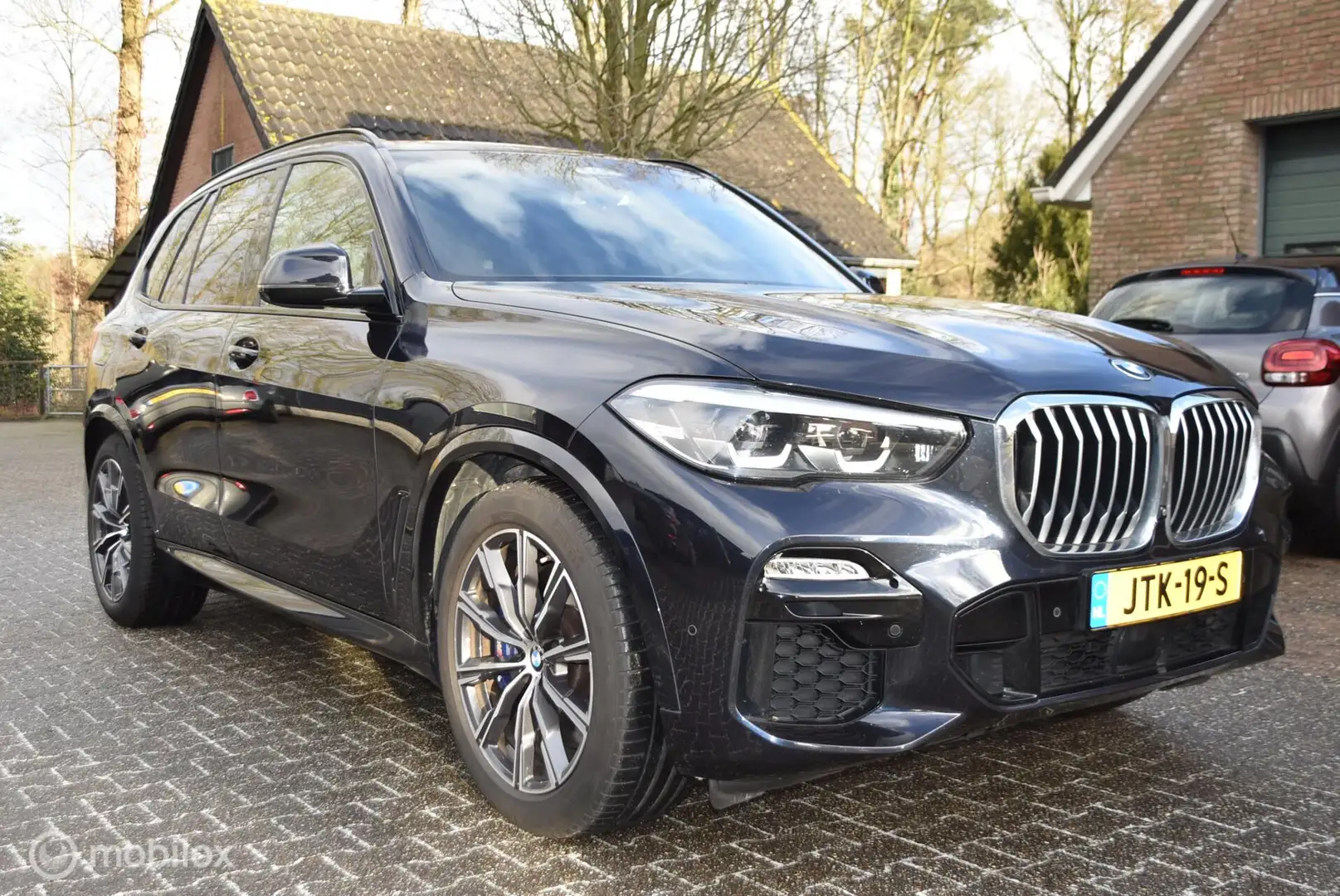 BMW X5 M 4.5E Sport Pano Komfortstoelen hybrid Aut Noir - 1