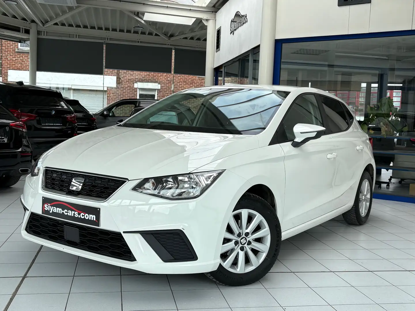 SEAT Ibiza 1.0i *GPS * PDC * JANTES * CARNET * Wit - 1