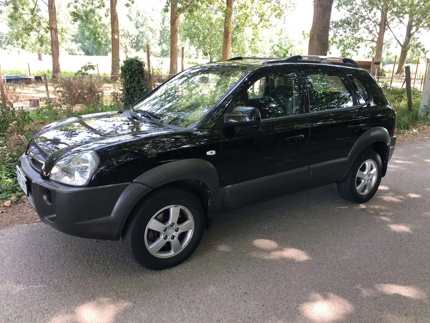 Hyundai TUCSON 2.0i 16v Comfort  57397 km Noir - 1