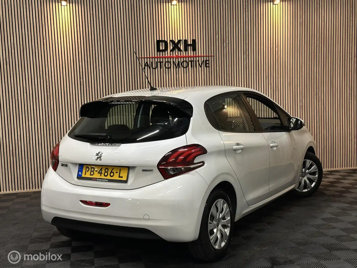 Peugeot 208 1.2 PureTech Executive 2eEIG CARPLAY DAB+ CRUISE Wit - 2