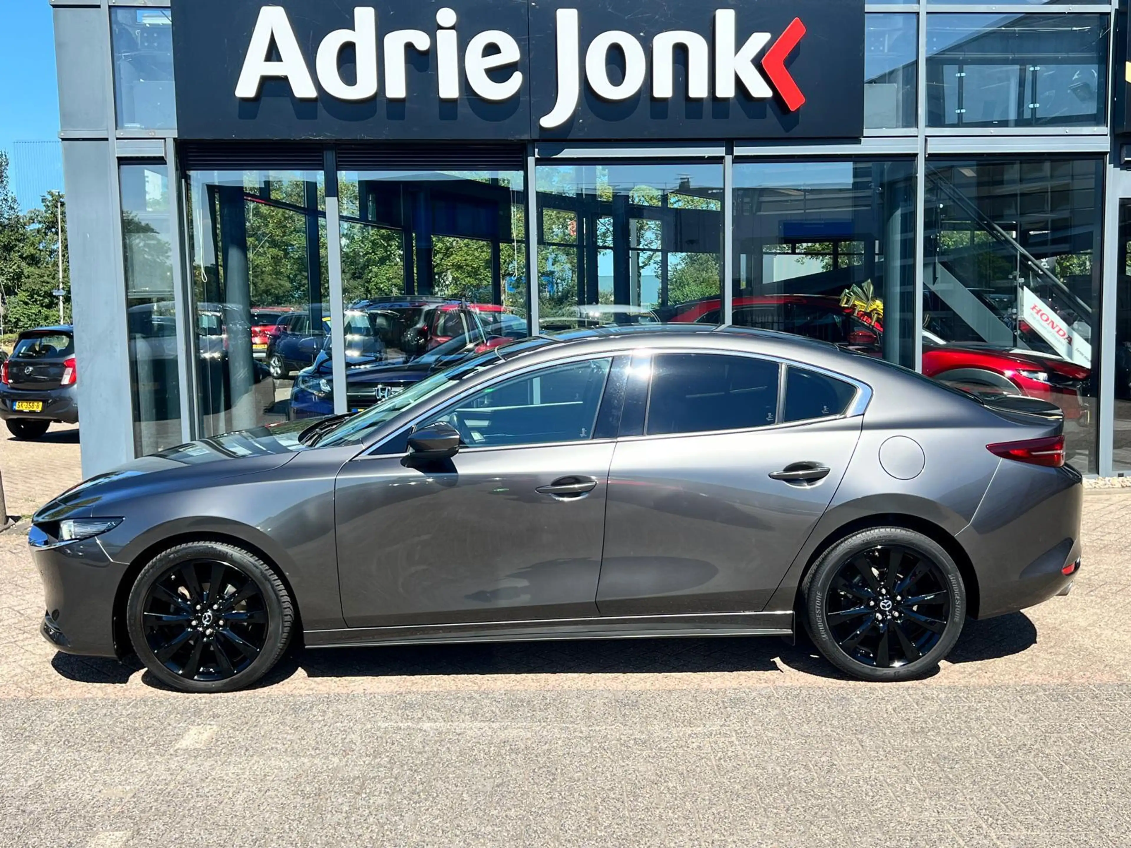 Mazda 3 2.0 e-SkyActiv-G M Hybrid 122 Luxury |18"LM VELGEN — photo 5