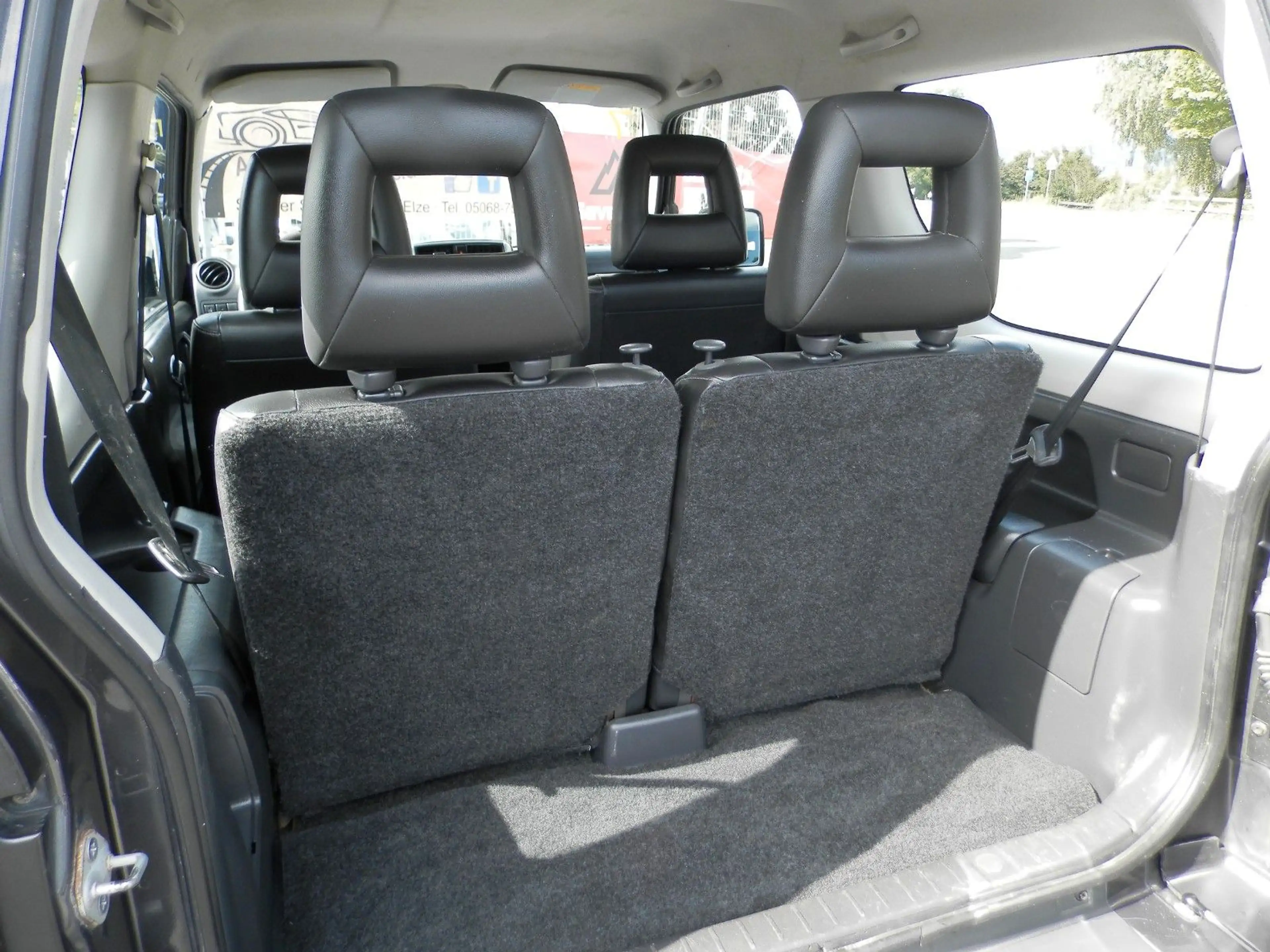 Suzuki Jimny Style Lim.*NR.7*Leder*Klima*AHK*ALU* — photo 4