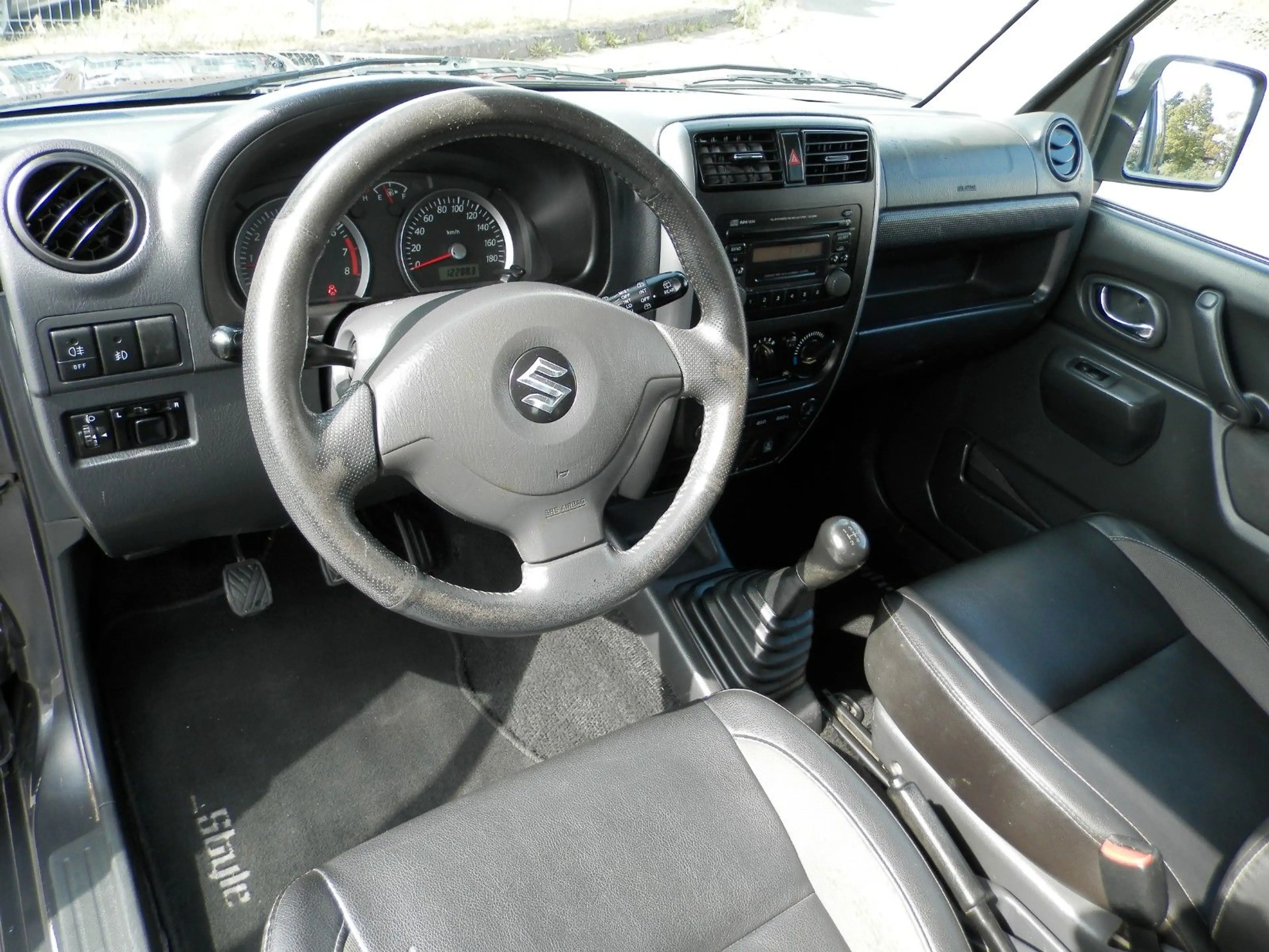 Suzuki Jimny Style Lim.*NR.7*Leder*Klima*AHK*ALU* — photo 8
