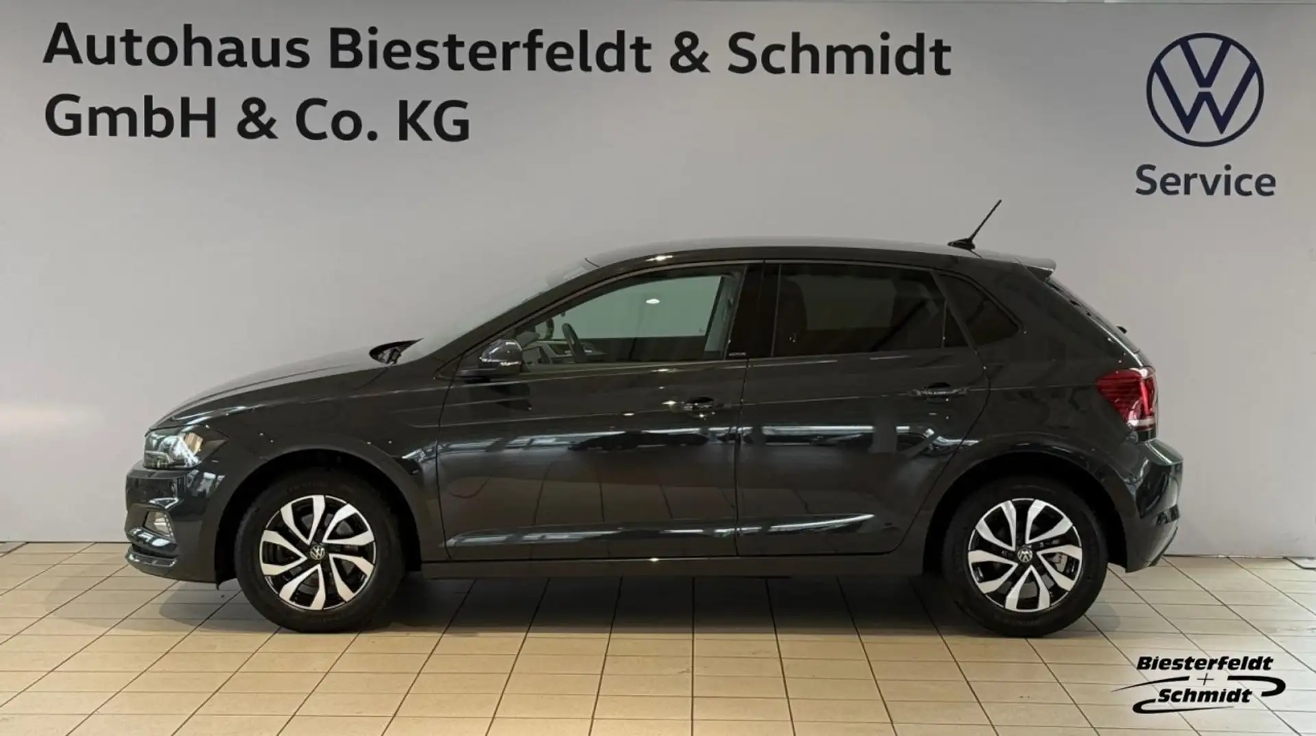 Volkswagen Polo 1.0TSI Active DSG APP PDC SHZ GJR Klima Navi Grijs - 1