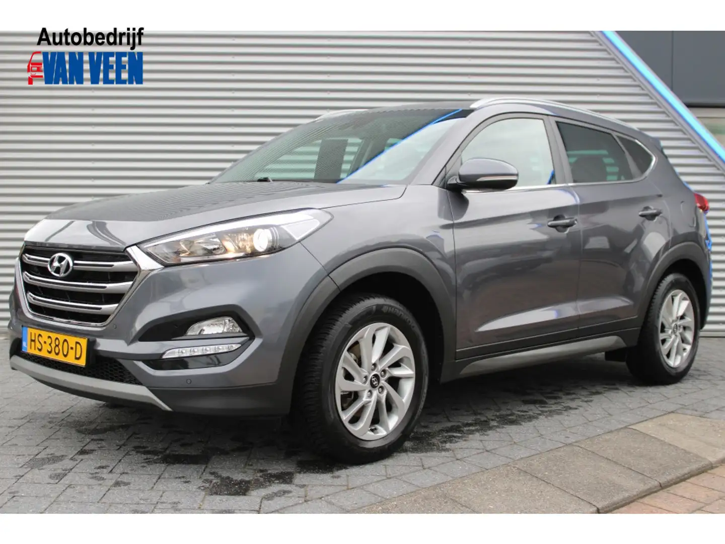 Hyundai TUCSON 1.6 GDi Comfort | Trekhaak | All-Season banden | C Gris - 1