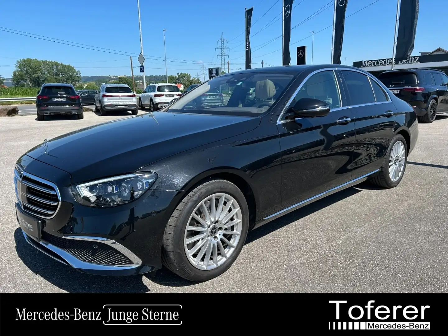 Mercedes-Benz E 450 4MATIC Limousine Pano AIR FAP Stdhzg MBUX Zwart - 1