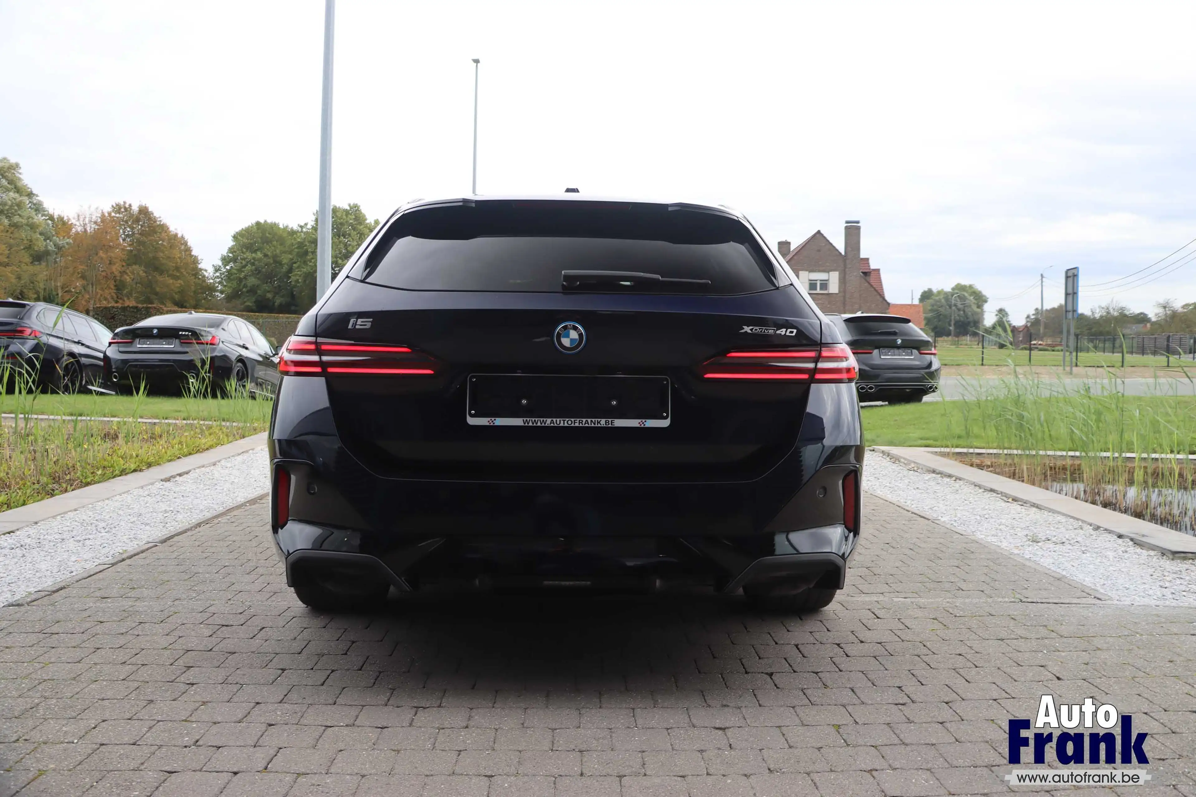 BMW i5 40 / BREAK / 4X4 / M-SPORT-PRO / 21" / SUSP PRO / DRIV PRO / B&W — photo 6
