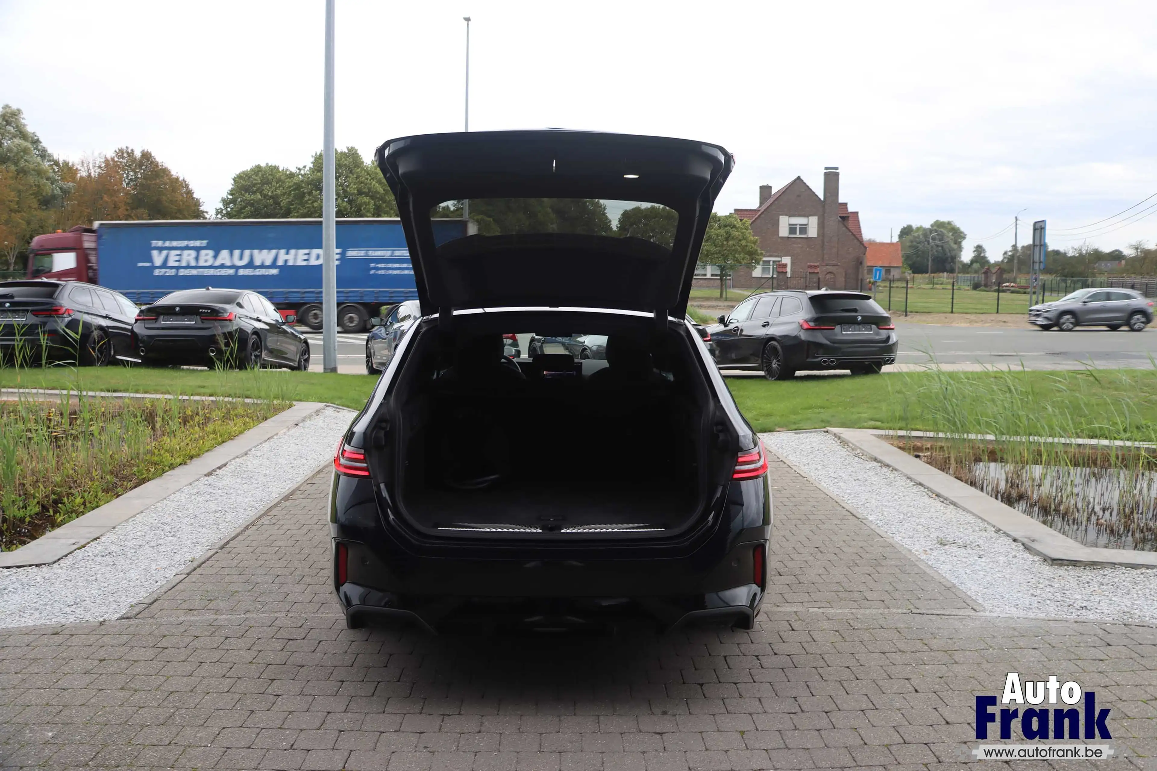 BMW i5 40 / BREAK / 4X4 / M-SPORT-PRO / 21" / SUSP PRO / DRIV PRO / B&W — photo 15