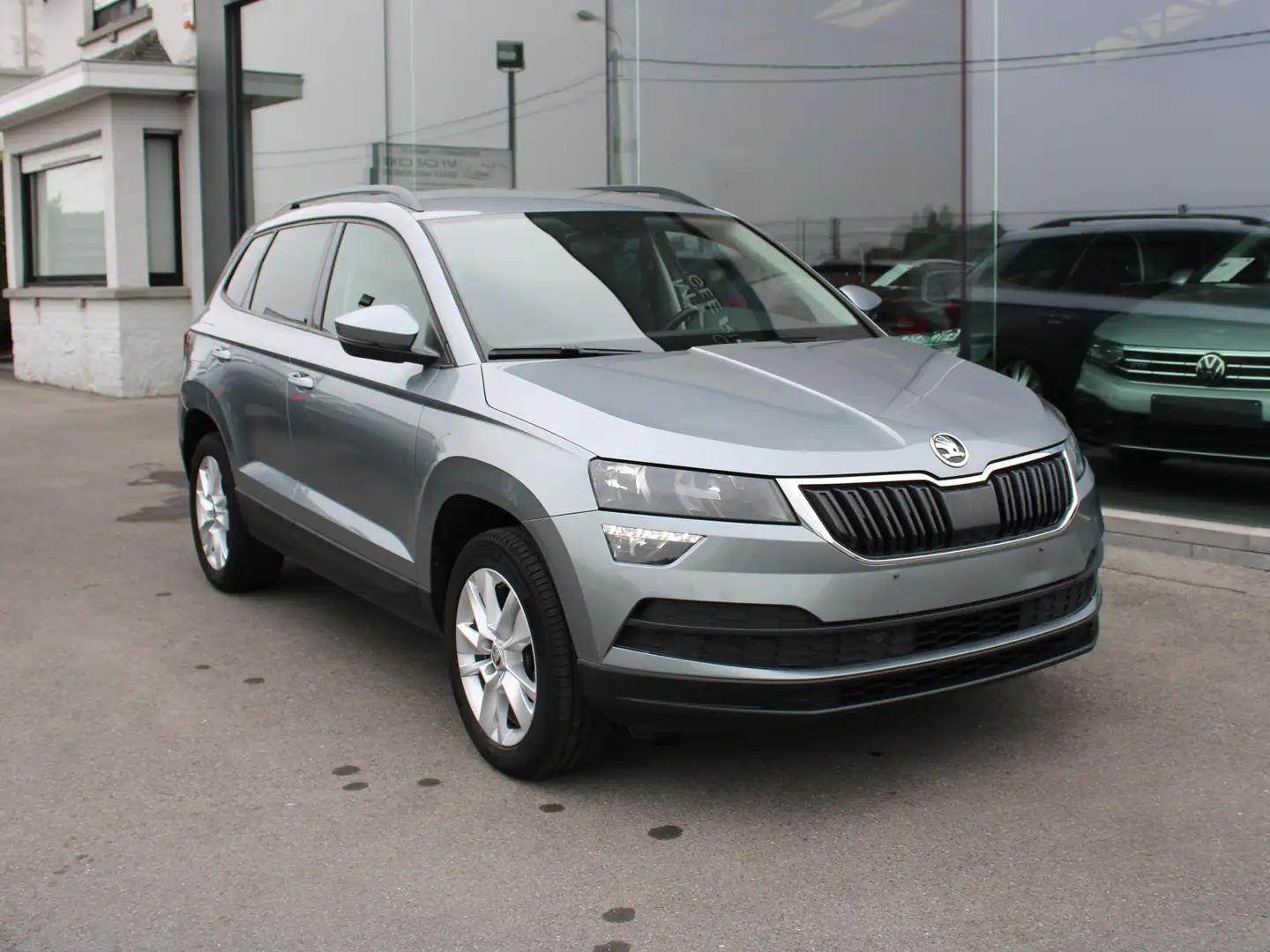Skoda Karoq 1.0 TSI DSG-NAVI-CAMERA-TREKHAAK-AIRCO-APP C-ALU V Grijs - 1