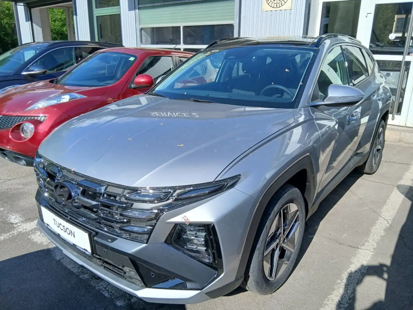 Hyundai TUCSON NX4 GO Plus 1,6 T-GDi HEV 2WD AT t6hu1-OO1 Silber - 1