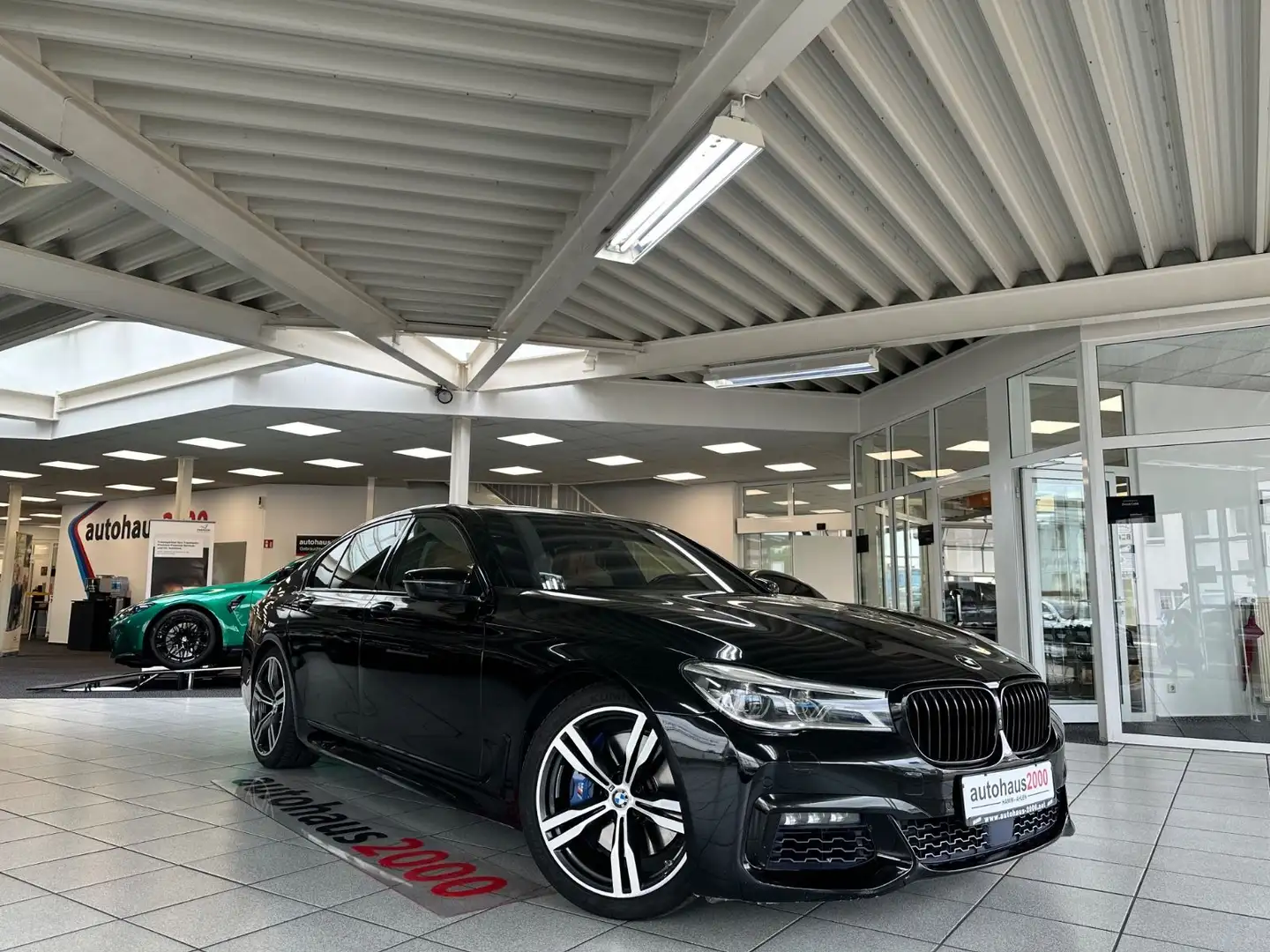BMW 750 i xDrive M Sportpaket LASER/HUD/360°/STANDHE. Schwarz - 1
