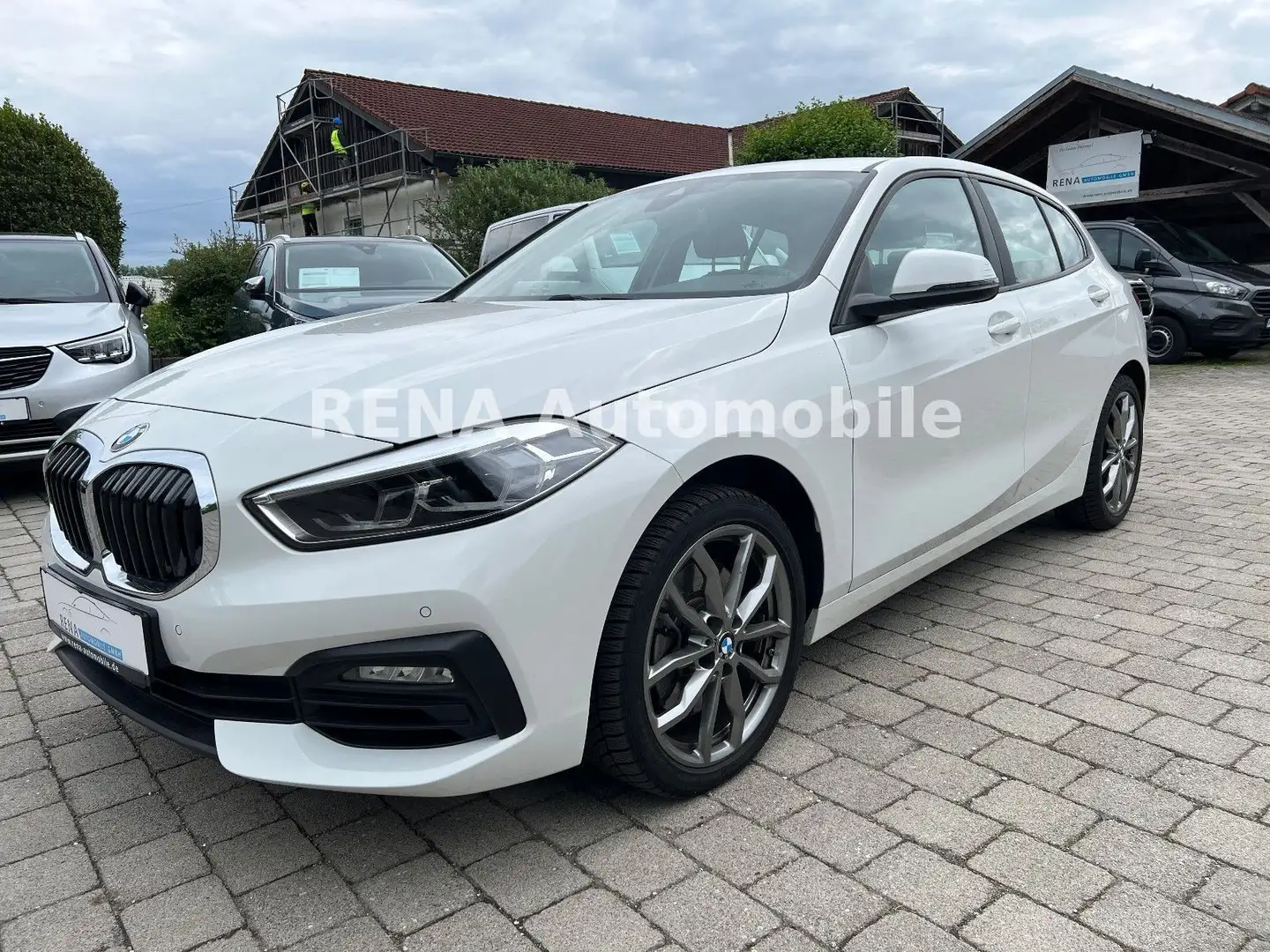 BMW 120 i Advantage 18 Zoll Navi*SHZ*el. Heckk.* Weiß - 1