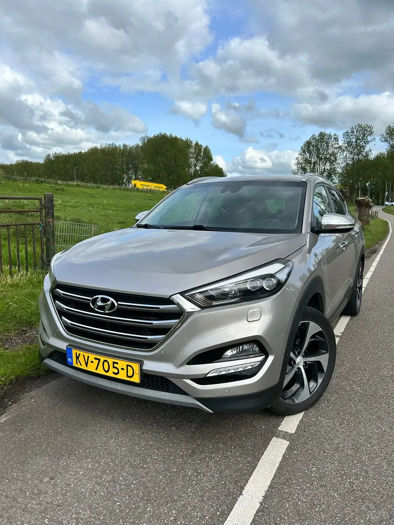 Hyundai TUCSON 1.6 T-GDi Prem. 4WD Beżowy - 1