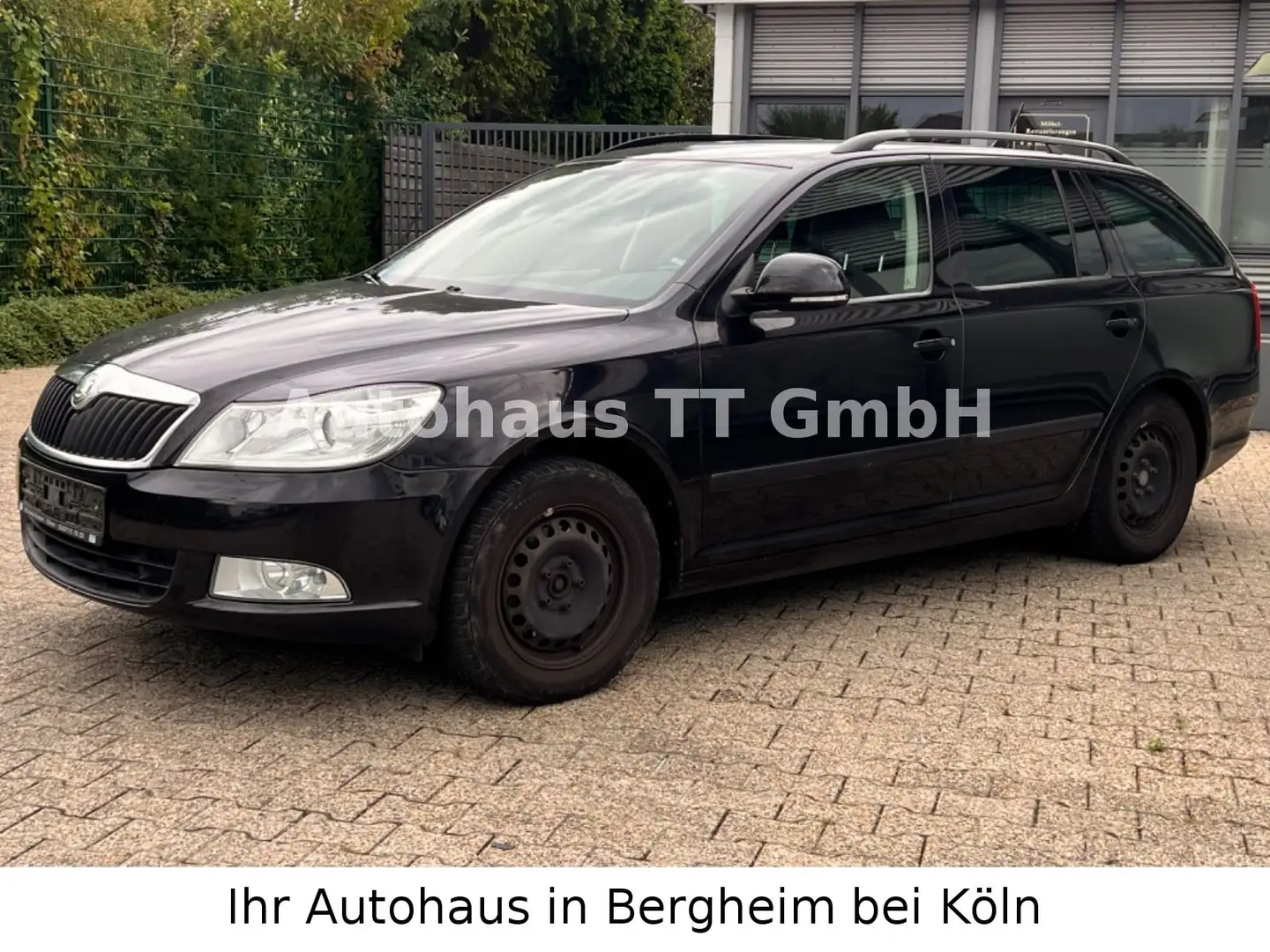 Skoda Octavia 2.0 TDI Combi°Sitz-Hz°Tempomat°PDC°EURO5 Schwarz - 1