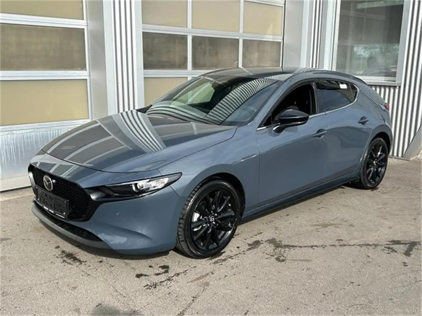 Mazda 3 e-Skyactiv-G140 Homura Aut. Automatik Grau - 1