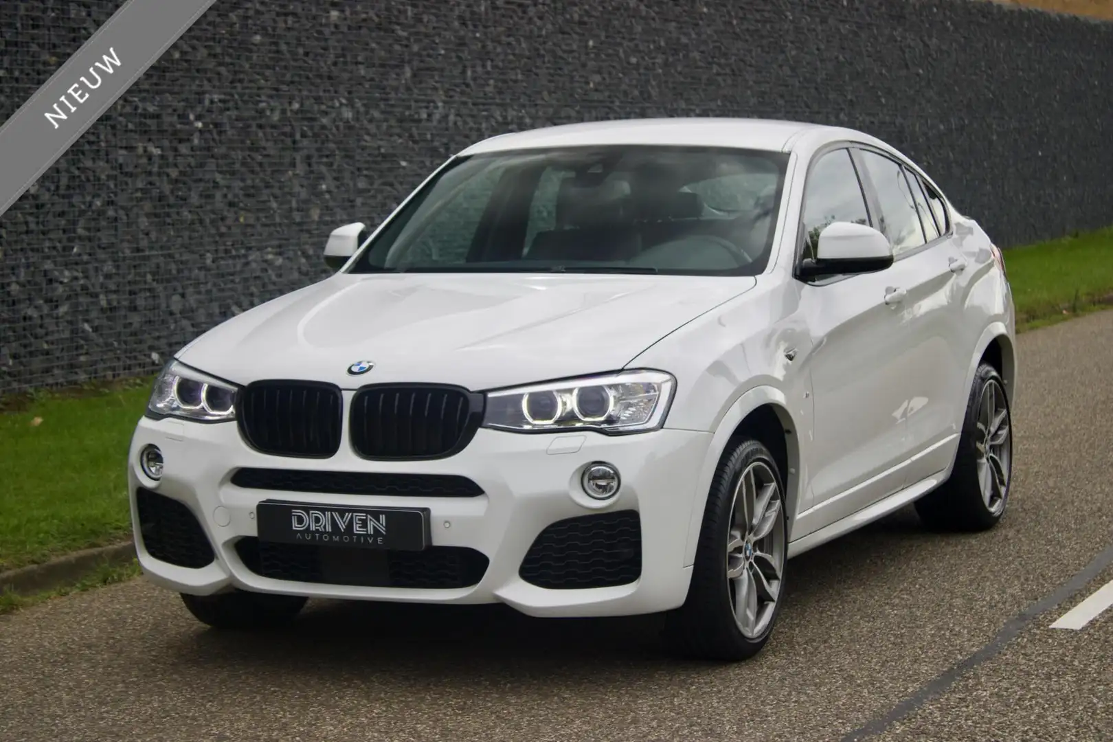 BMW X4 xDrive20i High Executive| M Pakket - CarPlay - 54d Wit - 1