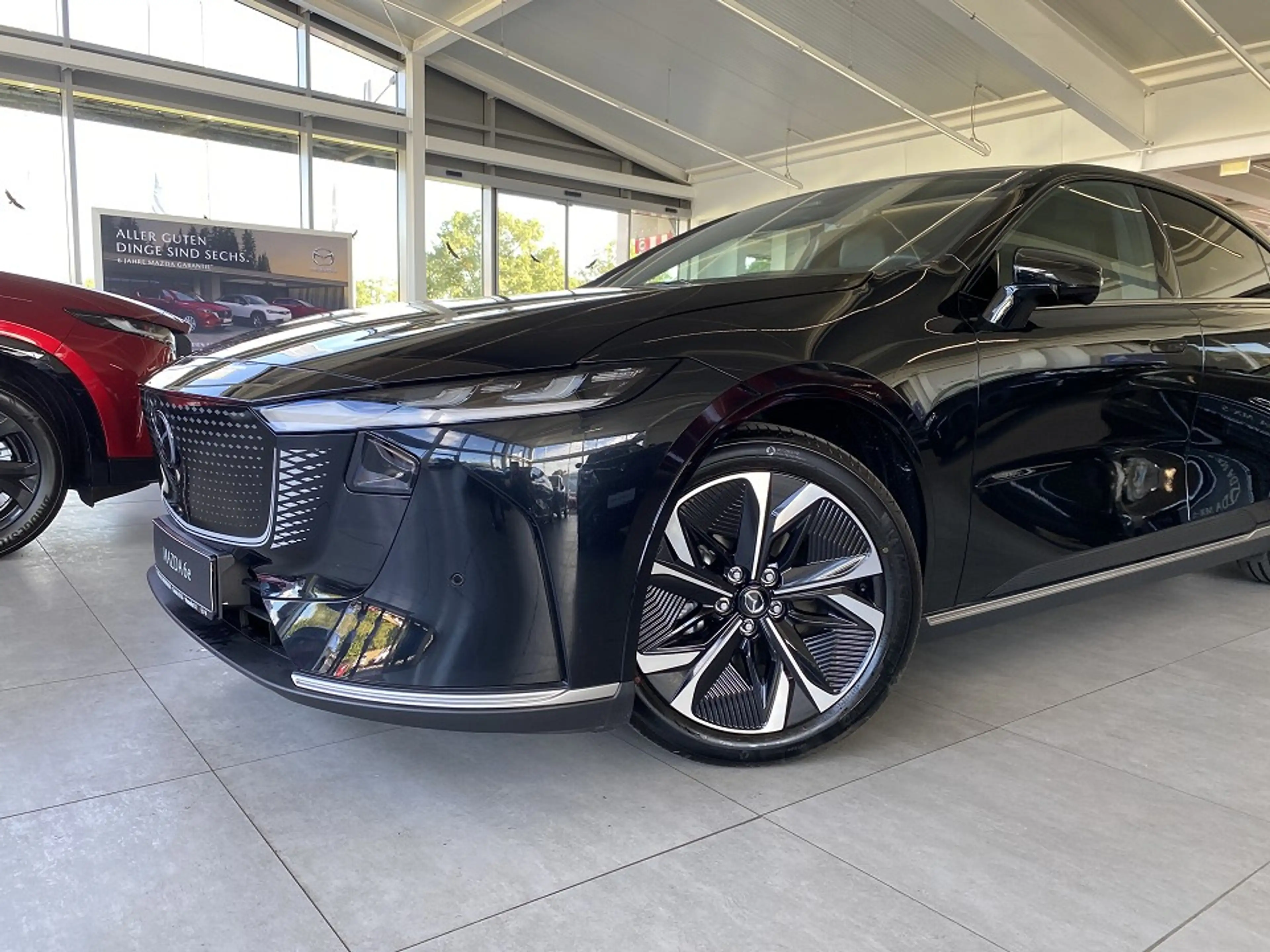 Mazda 6e EV Takumi Long Range bis zu 6.000 Umweltprämie — photo 4