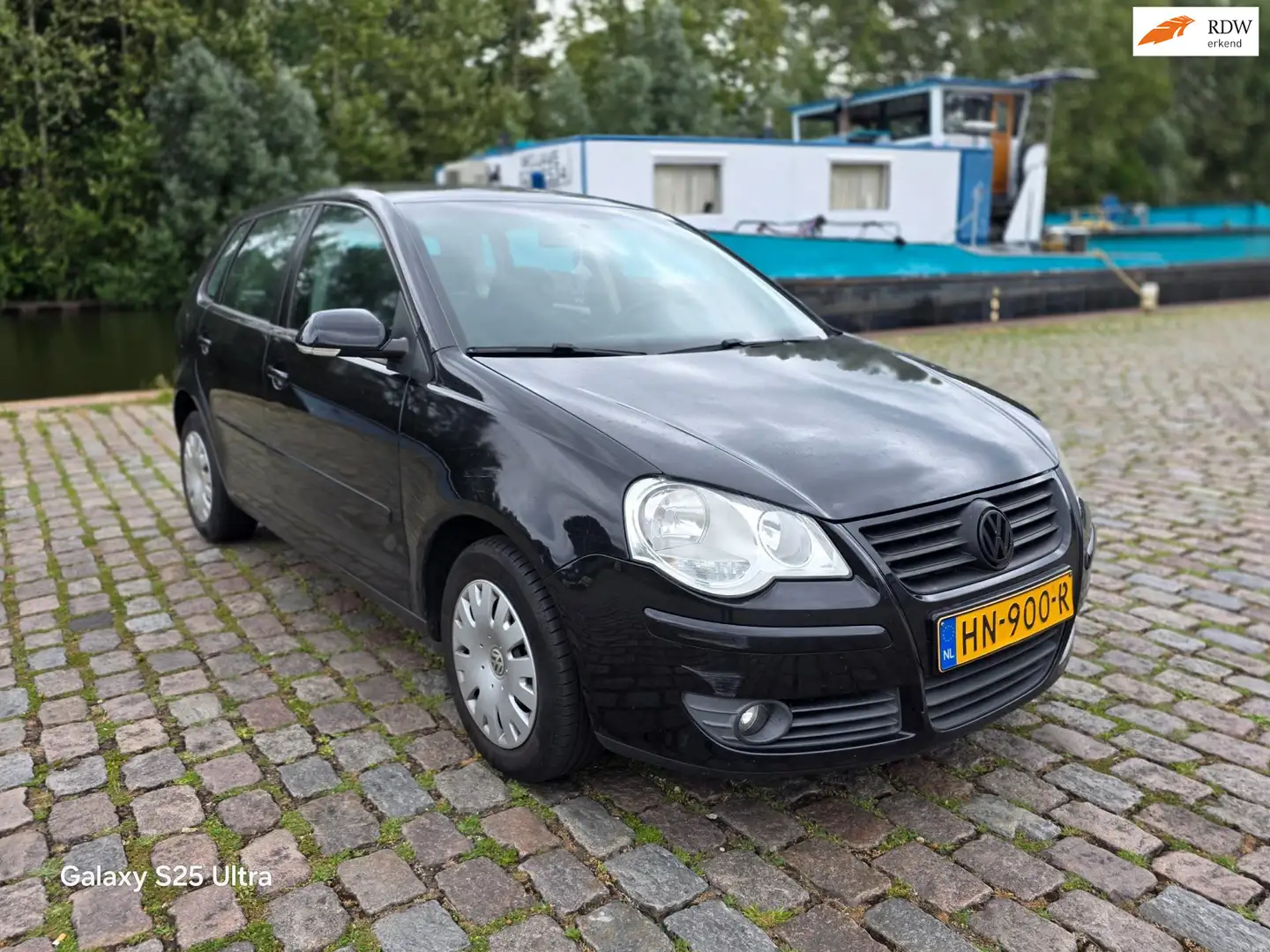 Volkswagen Polo 1.2 Trendline airco elektrische ramen cv op afs Zwart - 1